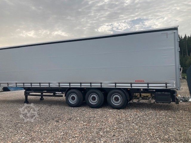 Open semitrailer with tarp KÖGEL SN24 NEU+Lift+SAF+EN12642XL+Hubdach+sofort