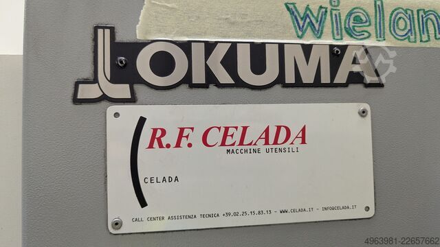CNC lathe with bar feeder OKUMA L300-MW