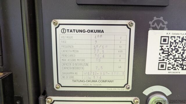 CNC lathe with bar feeder OKUMA L300-MW