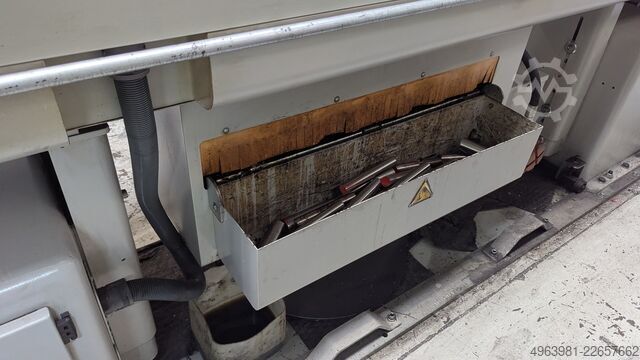 CNC lathe with bar feeder OKUMA L300-MW