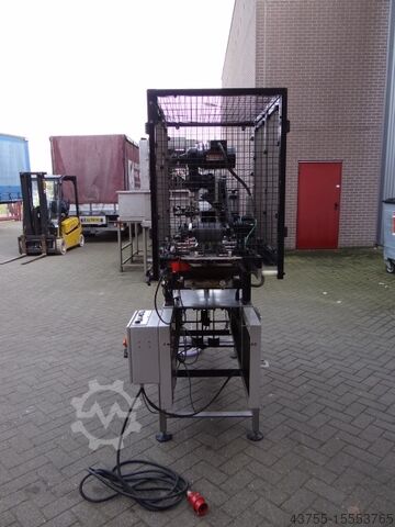 Can labeling machine Beth Purdy Gravil Roll Trough