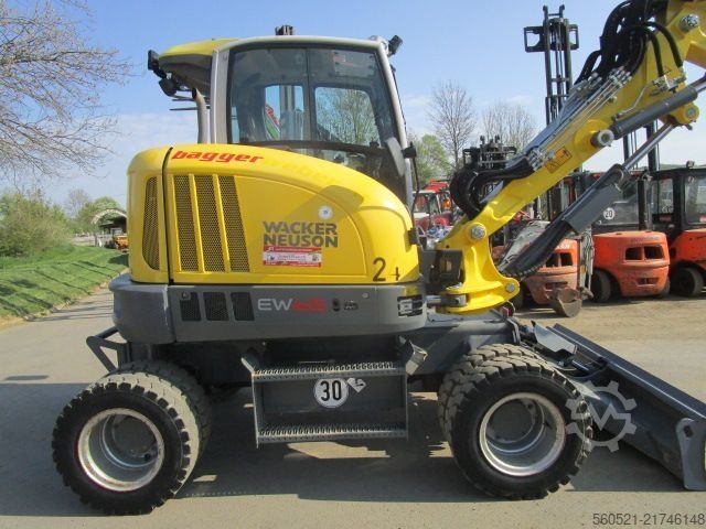 Mobile excavator Neuson EW 65 - Martin-POWERTILT + Schnellw.+ 4 Löffel