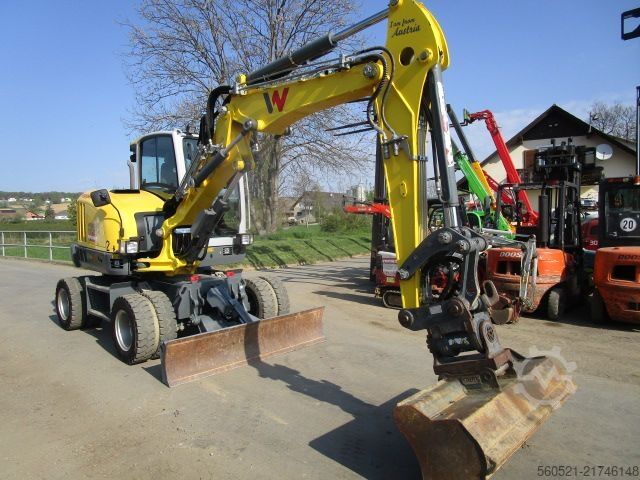 Mobile excavator Neuson EW 65 - Martin-POWERTILT + Schnellw.+ 4 Löffel