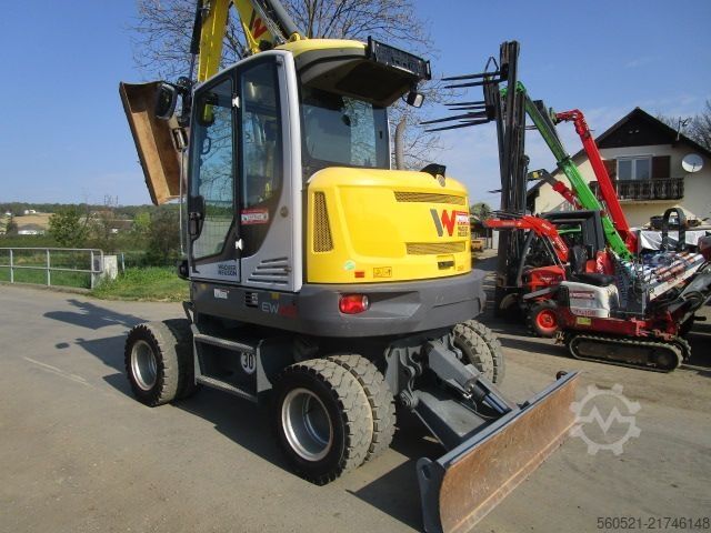 Mobile excavator Neuson EW 65 - Martin-POWERTILT + Schnellw.+ 4 Löffel