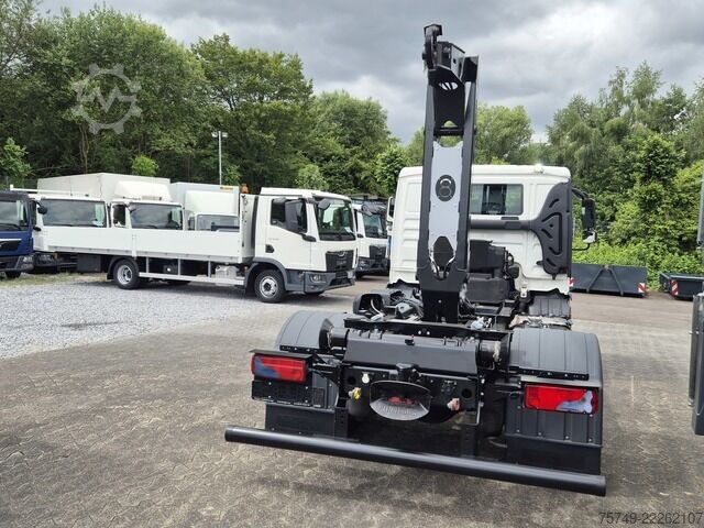 Roll-off tipper truck man TGL 12.220 BL City Abrollkipper  AHK Euro 6
