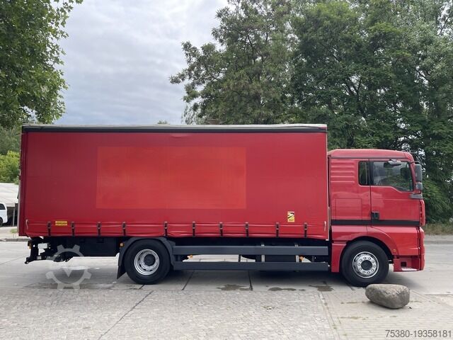 Flatbed truck with tarp man TGA 18.350 Edscha Klima*Webasto*AHK*