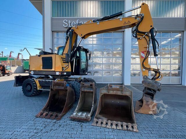 Radbagger Hydrema MX14G / OilQuick OQ65 / 4x Löffel / 2.343h /2022