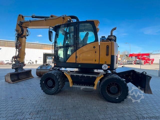 Radbagger Hydrema MX14G / OilQuick OQ65 / 4x Löffel / 2.343h /2022