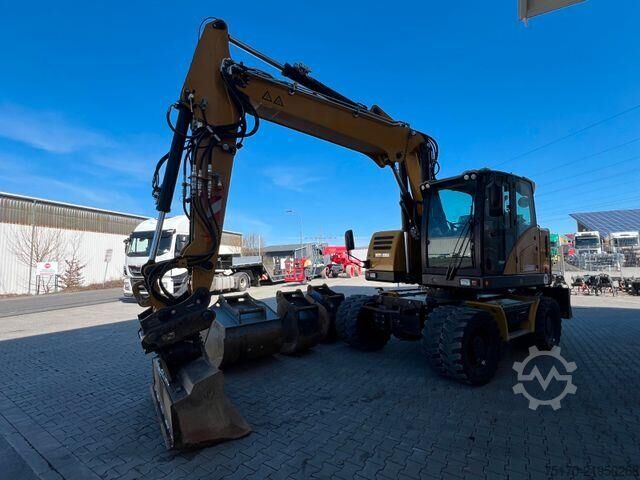 Radbagger Hydrema MX14G / OilQuick OQ65 / 4x Löffel / 2.343h /2022
