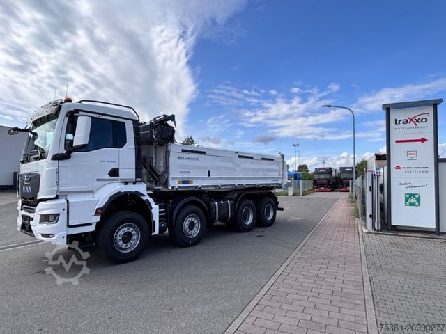 Three-sided tipper truck MAN TGS 35.540 MEILLER Trigenius mit el. Plane Navi