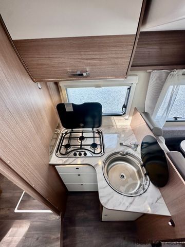 Teilintegriertes Wohnmobil CARADO T 449 *Queensbett-Hubbett-Sat-TV*