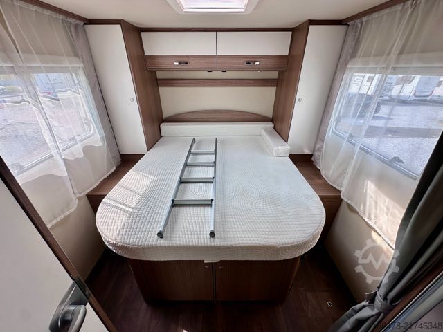 Teilintegriertes Wohnmobil CARADO T 449 *Queensbett-Hubbett-Sat-TV*