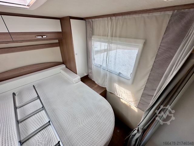 Teilintegriertes Wohnmobil CARADO T 449 *Queensbett-Hubbett-Sat-TV*