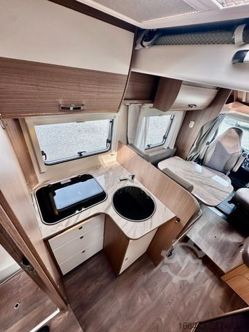 Teilintegriertes Wohnmobil CARADO T 449 *Queensbett-Hubbett-Sat-TV*