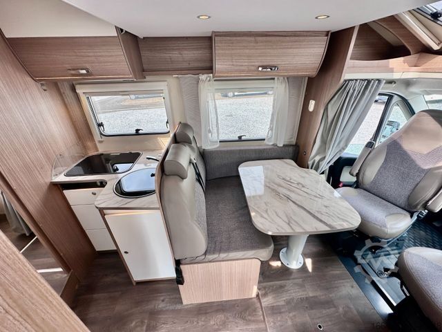 Teilintegriertes Wohnmobil CARADO T 449 *Queensbett-Hubbett-Sat-TV*