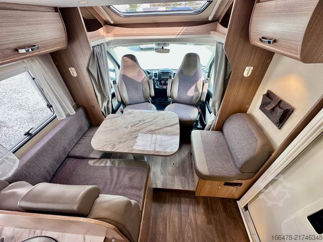 Teilintegriertes Wohnmobil CARADO T 449 *Queensbett-Hubbett-Sat-TV*