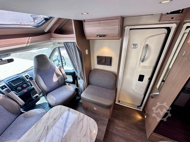 Teilintegriertes Wohnmobil CARADO T 449 *Queensbett-Hubbett-Sat-TV*