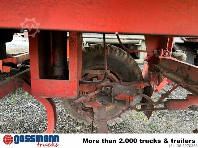 Three-way tipper trailer  Gummiwagen 3-Seiten-Kippanhänger