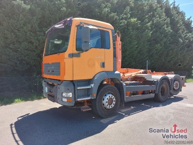 Roll-off tipper truck MAN TGA 26.313 FNLC  Abrollkipper NHC 20-53 SK