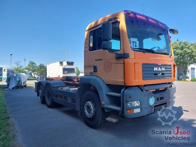 Roll-off tipper truck MAN TGA 26.313 FNLC  Abrollkipper NHC 20-53 SK