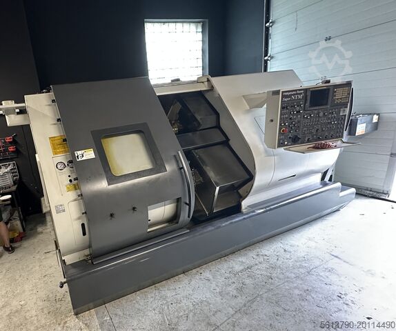 Nakamura-Tome NTM3 CNC-Drehmaschine mit 6m Stangenlader IRCO SiMag Breuning Nakamura-Tome Super NTM3