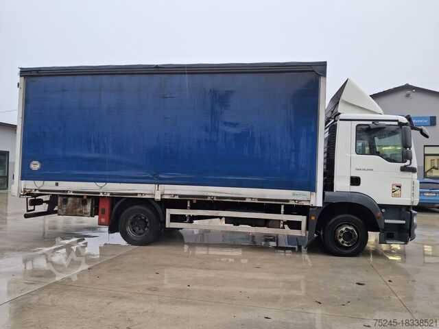 Flatbed truck with tarpaulin MAN TGM. 12. 250