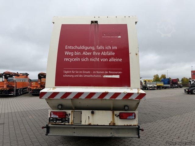 Garbage truck MAN TGS 26.320 6x2 BL Faun Frontlader