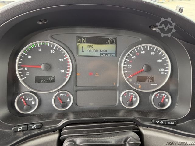 Garbage truck MAN TGS 26.320 6x2 BL Faun Frontlader