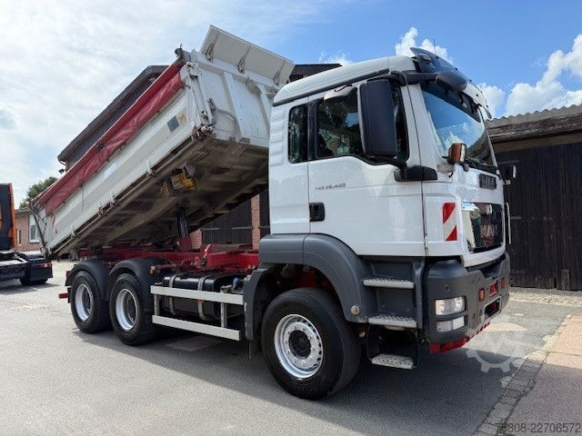 Three-sided tipper truck MAN 26.480 6x4BB Meiller Schalt Klima AHK Hydraulik