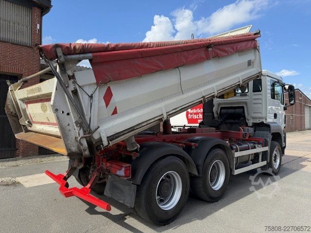 Three-sided tipper truck MAN 26.480 6x4BB Meiller Schalt Klima AHK Hydraulik