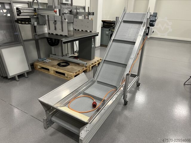 Stanzmaschine Conveyor belt for waste removal from guillotine, three-knife trimmer
