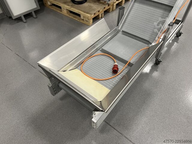 Stanzmaschine Conveyor belt for waste removal from guillotine, three-knife trimmer
