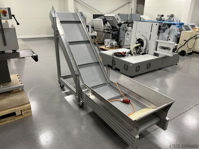 Stanzmaschine Conveyor belt for waste removal from guillotine, three-knife trimmer