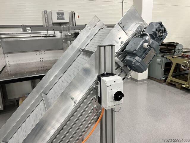 Stanzmaschine Conveyor belt for waste removal from guillotine, three-knife trimmer