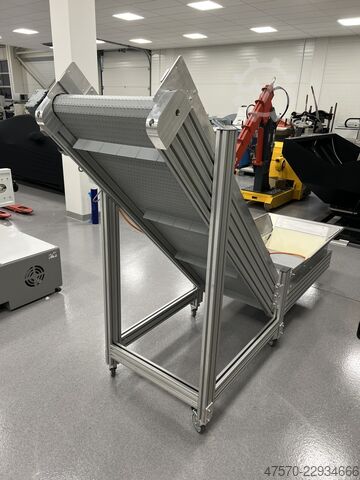 Stanzmaschine Conveyor belt for waste removal from guillotine, three-knife trimmer