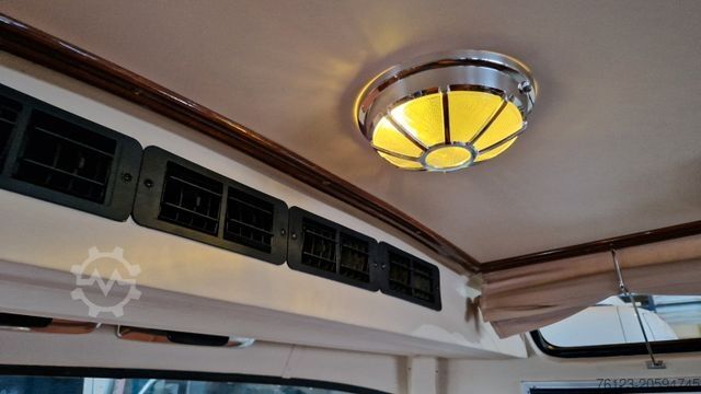 Minibus MERCEDES-BENZ Vorgänger Sprinter O 319 Samba mit Faltdach AC