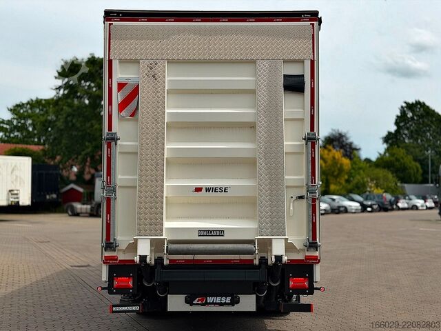 Flatbed truck with tarp MAN TGX 26.440 6x2 mit Schwerlast-Ladebordwand Rampe