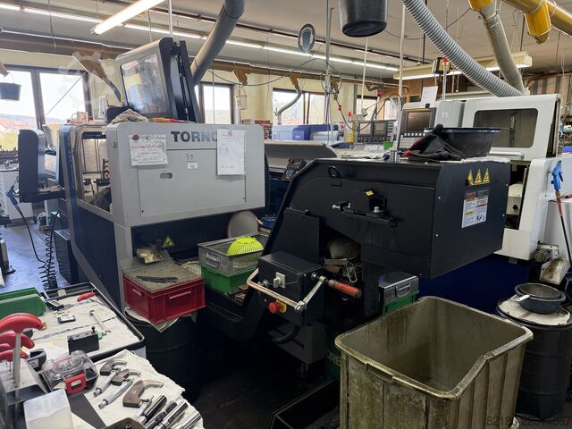 Turning automatic lathe Tornos Swiss DT 26