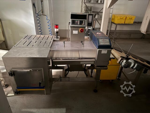 Komplettes Wiege- und Verpackungssystem Complete weighing and packing system Complete system
