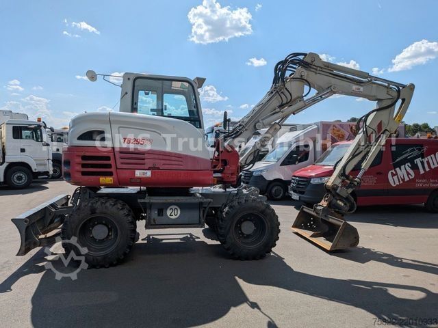 Mobile excavator TAKEUCHI TB 295 W / POWERTILT OQ45 / Planierschild