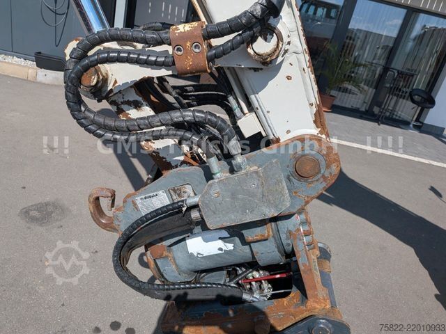 Mobile excavator TAKEUCHI TB 295 W / POWERTILT OQ45 / Planierschild