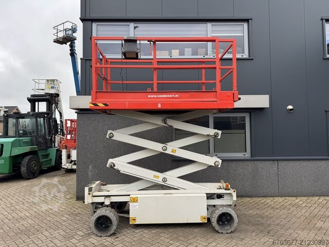 Holland-Lift Y 64 EL 14 Scherenarbeitsbühne / Scherenbühne 8,4 m Arbeitshöhe elektrisch 2015 HOLLAND-LIFT Y 64 EL 14 Schaarhoogwerker / Sciccor lift 8.4M Werkhoogte Elektrisch 2015