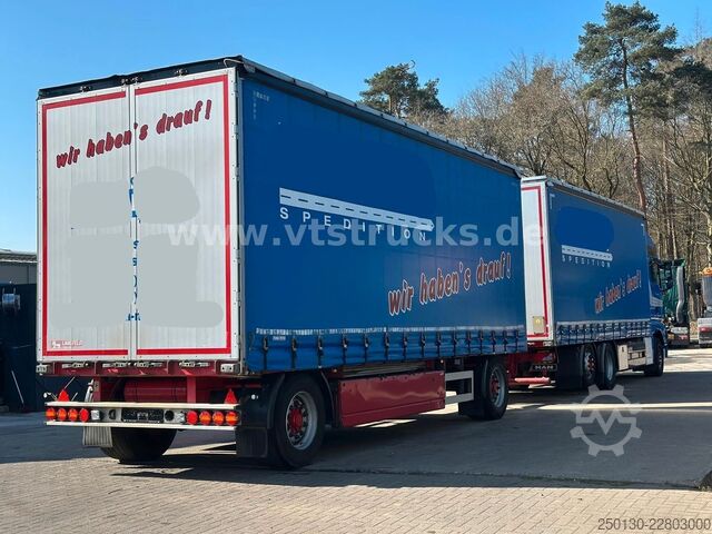 Flatbed truck with tarp MAN TGX 26.440