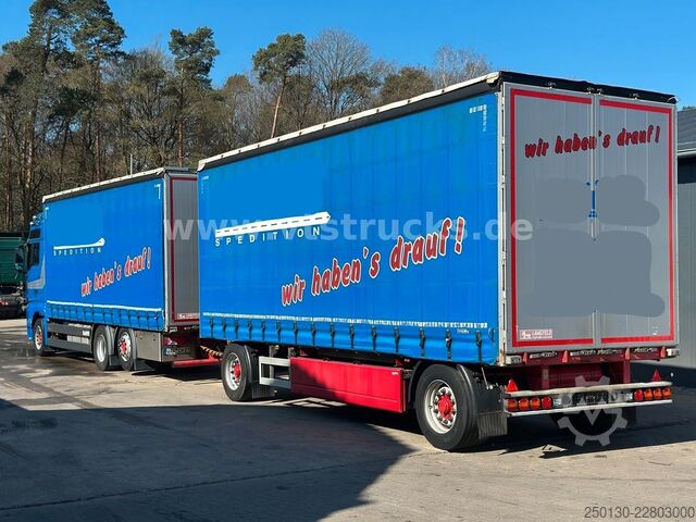 Flatbed truck with tarp MAN TGX 26.440