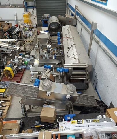 Pellet-Bratlinie von Heat & Control mit einer Kapazität von ca. 450 kg/Stunde HEAT & CONTROL 450 kg/hour