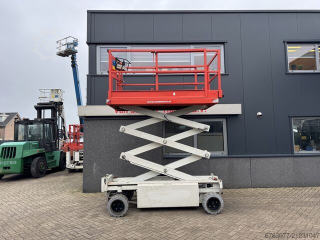 Holland-Lift Y 64 EL 14 Scherenarbeitsbühne / Scherenbühne 8,4 m Arbeitshöhe elektrisch 2015 HOLLAND-LIFT Y 64 EL 14 Schaarhoogwerker / Sciccor lift 8.4M Werkhoogte Elektrisch 2015