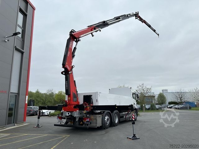 Flatbed truck MAN TGS 26.520 6x2-4 Pritsche Fassi F255RA2.24 + JIB