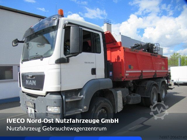 Tipper truck MAN 26.440 / 6 x 4 / Jonsered 1100 / Greifer