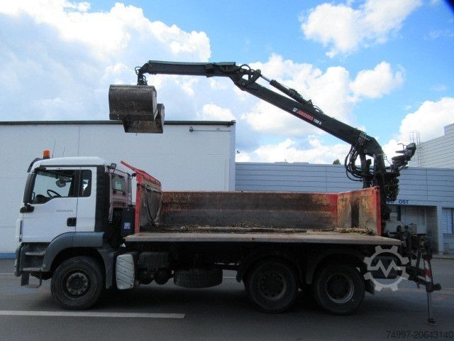 Tipper truck MAN 26.440 / 6 x 4 / Jonsered 1100 / Greifer