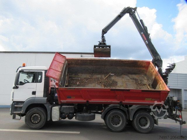 Tipper truck MAN 26.440 / 6 x 4 / Jonsered 1100 / Greifer